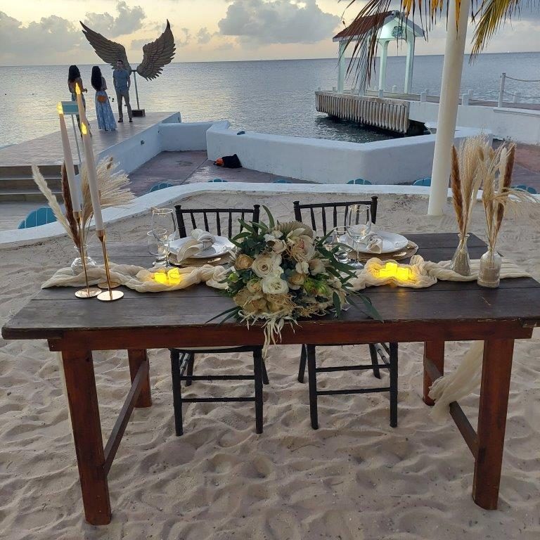 Sweetheart table for bride and groom, sunset in Cozumel